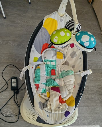 Продаю электрокачель 4moms - изображение 1